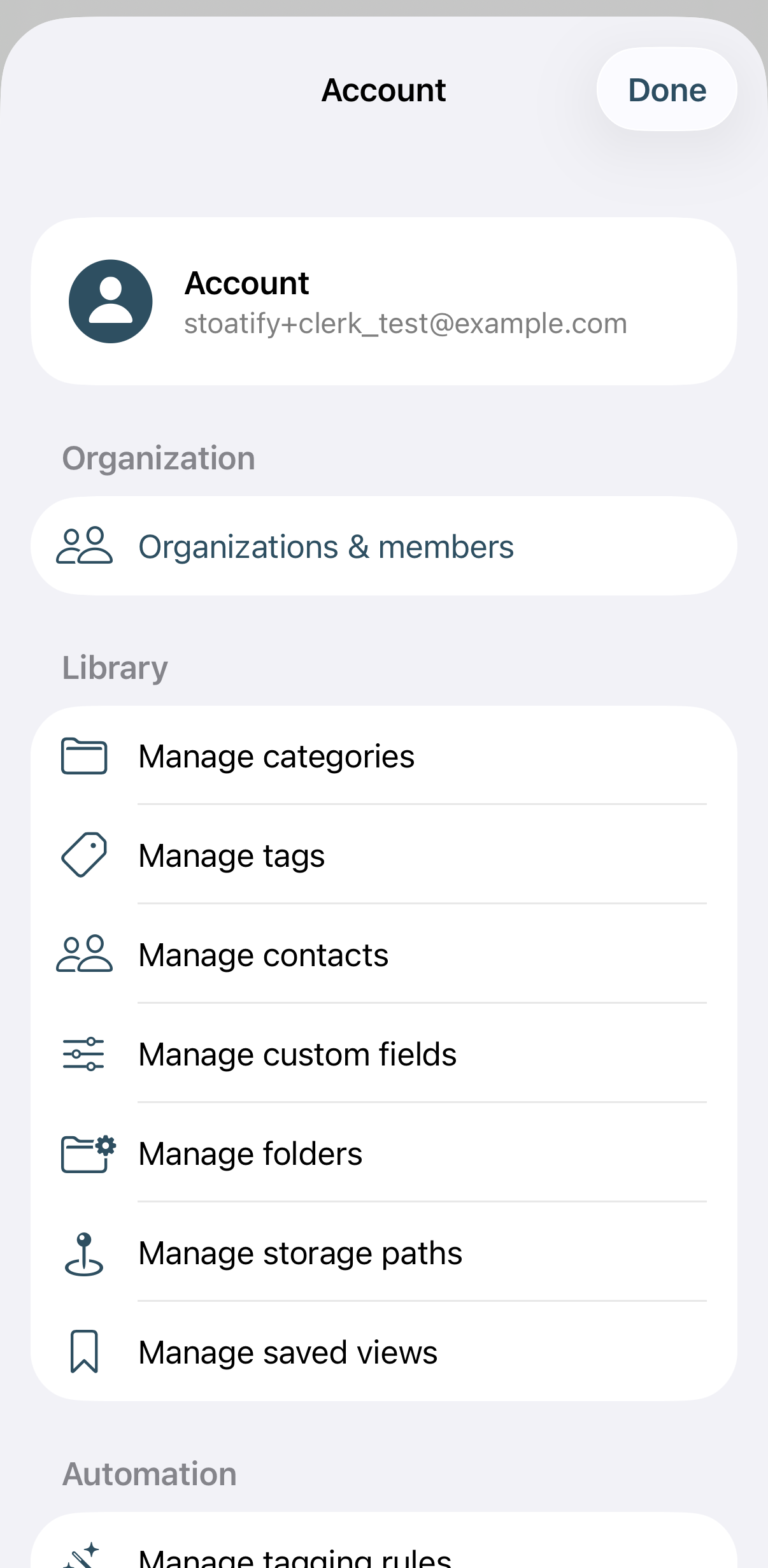 The account and settings screen in the Stoatify app, showing the signed-in account, organizations and members, and library settings