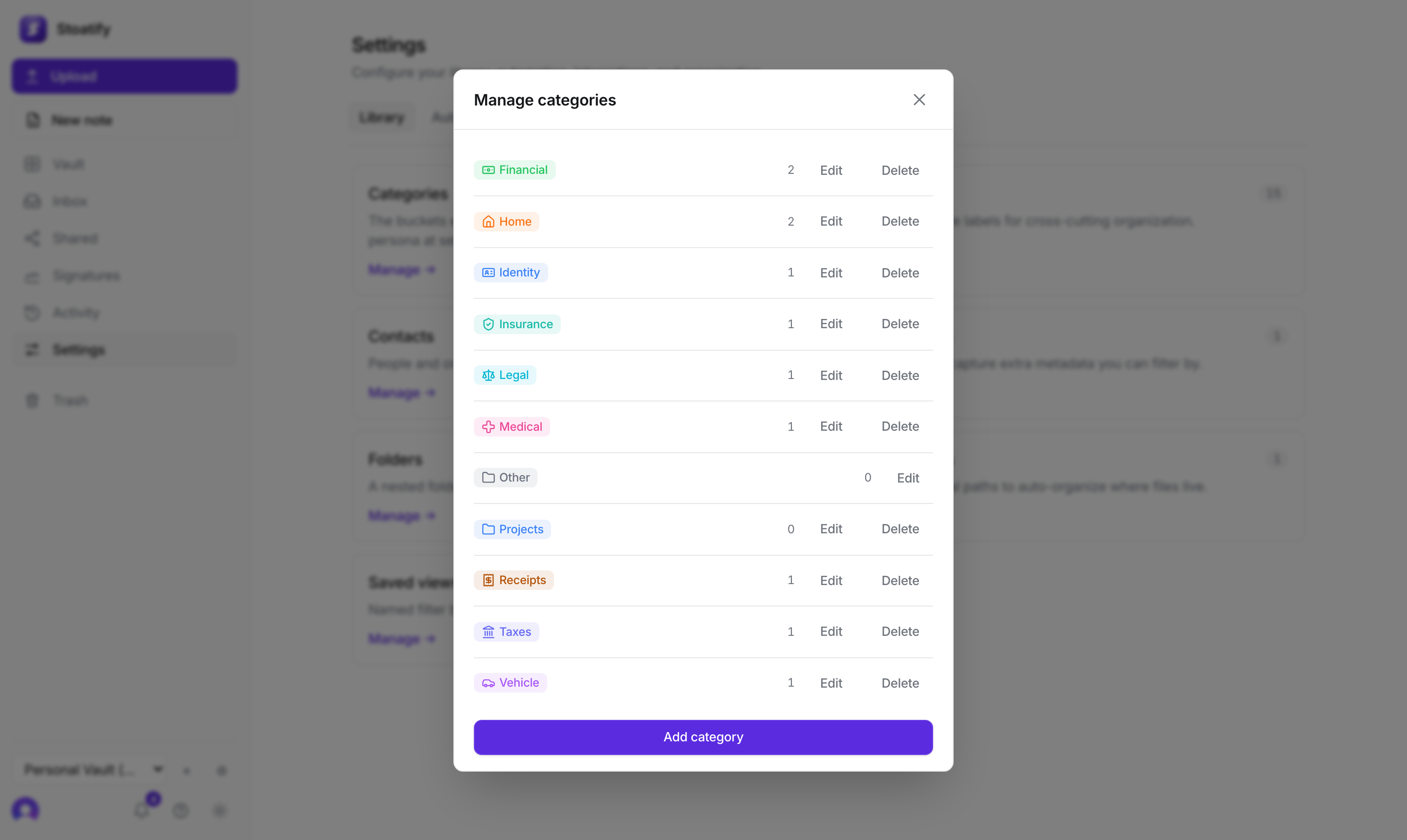 The Manage categories screen in Stoatify: each category with its icon, color, and document count, plus Edit and Delete