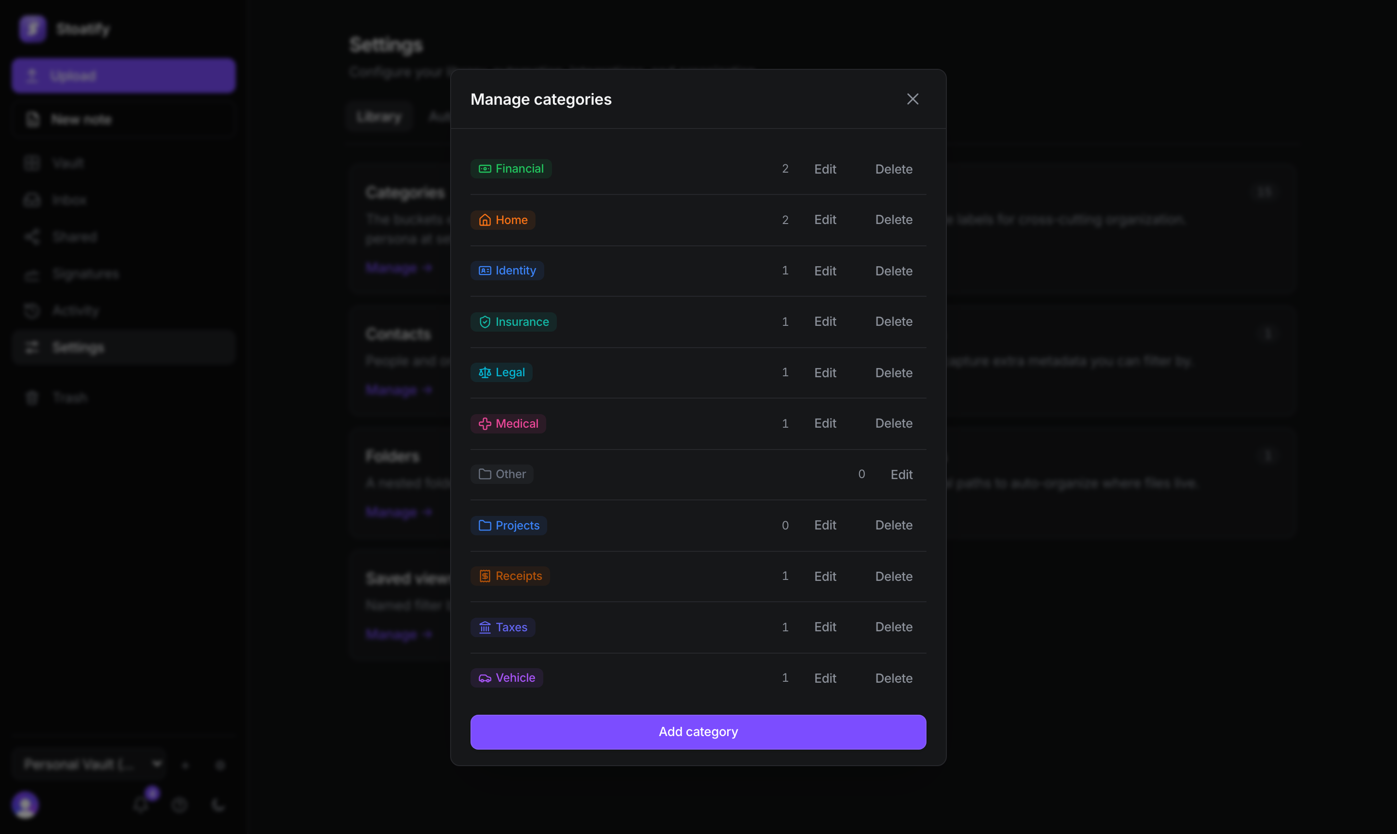 The Manage categories screen in Stoatify: each category with its icon, color, and document count, plus Edit and Delete